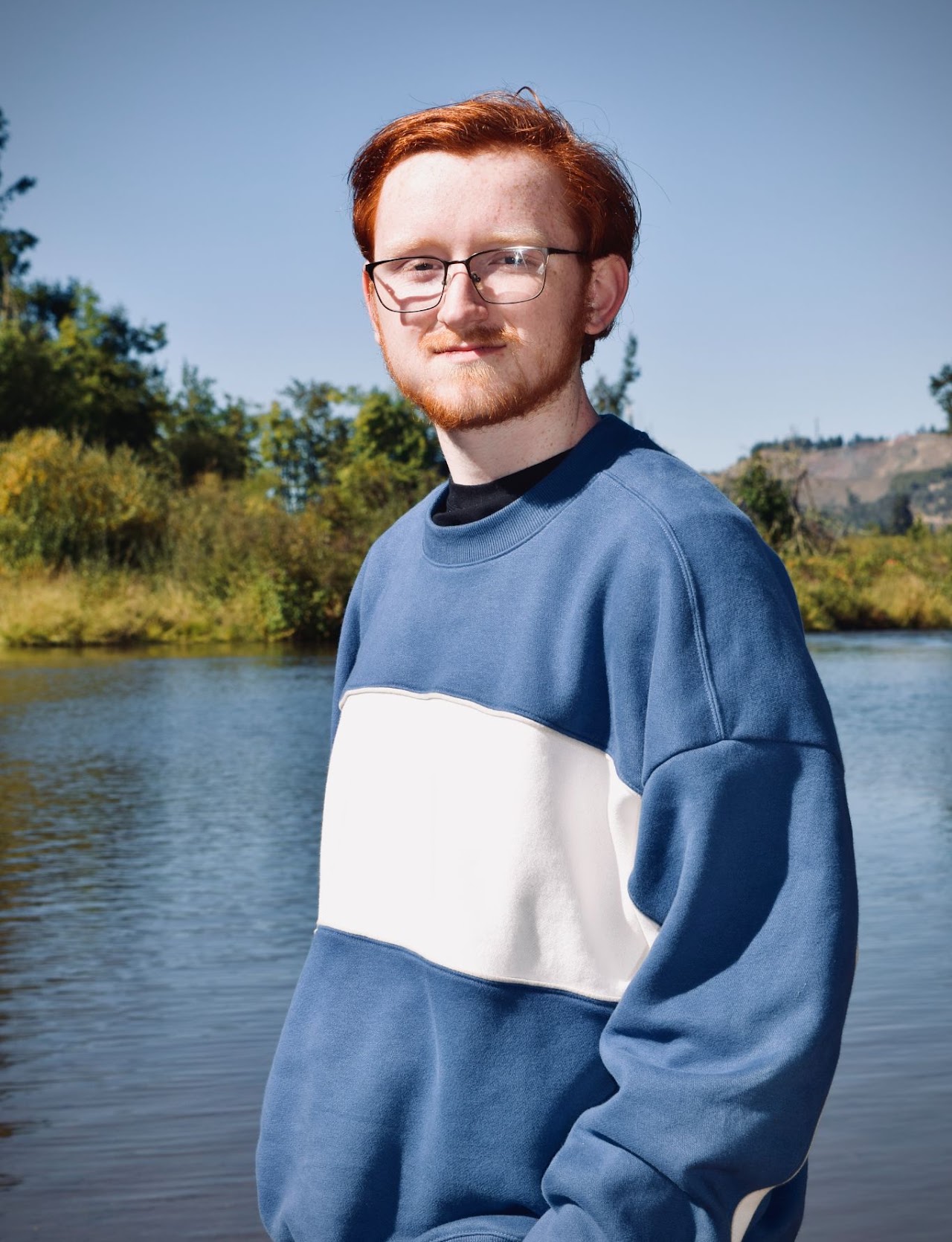 Blake McHaffie beside a lake